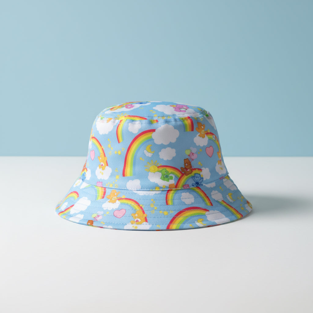 Bucket hat with rainbow and cloud pattern on a light blue background