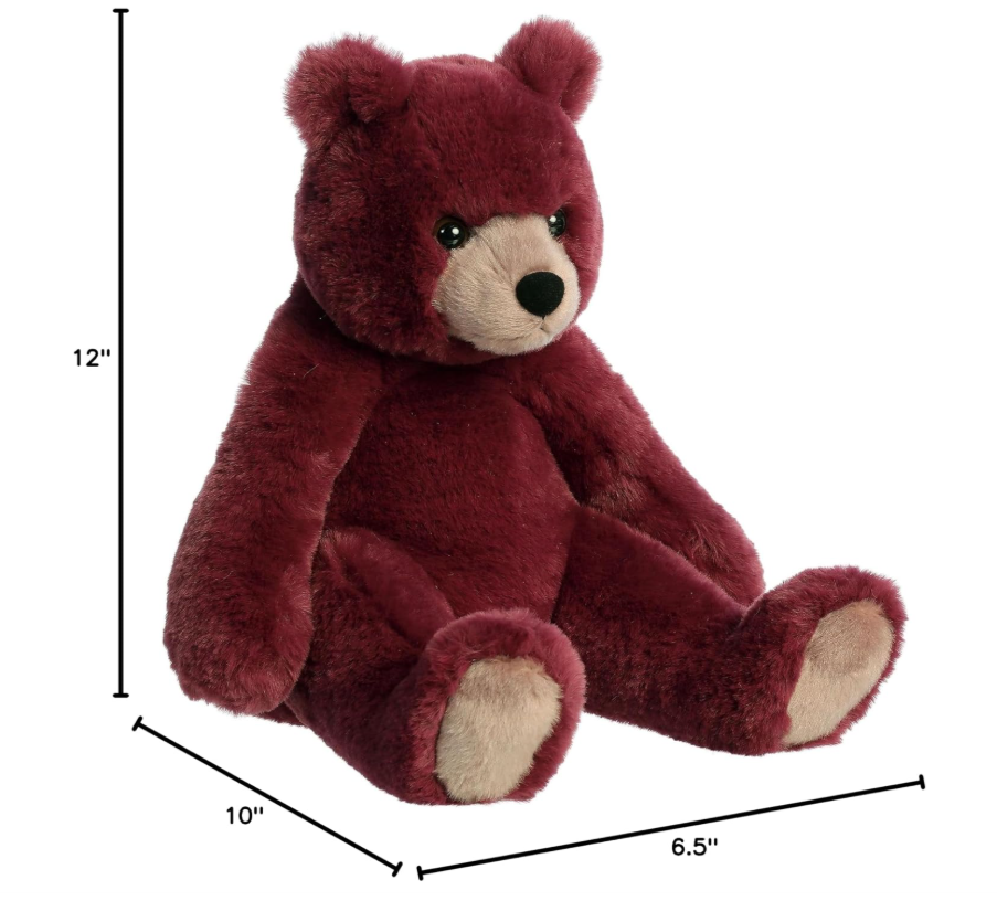 Red teddy bear with measurements on a white background