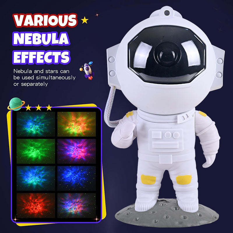 A white astronaut-shaped projector lamp with a detachable head and body, projecting colorful nebula effects onto a wall or ceiling.