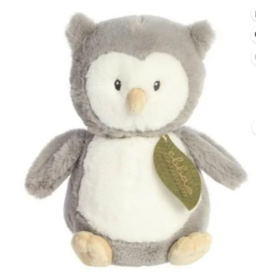 Plush owl toy with a green tag on a white background