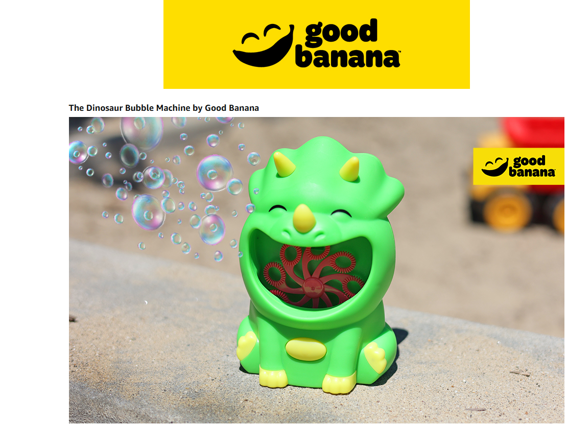 Green dinosaur bubble machine by Good Banana on a sandy background