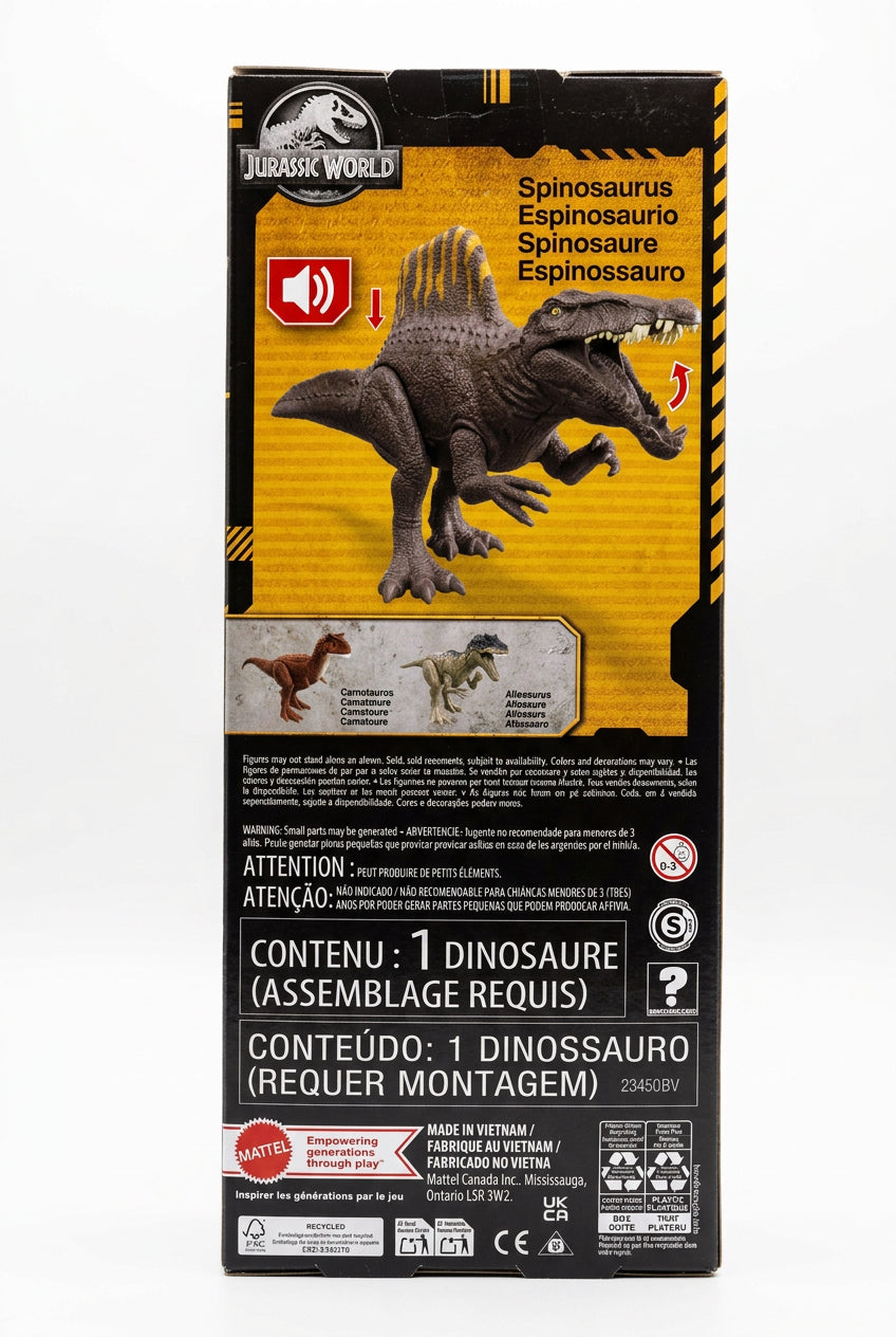 The retail packaging box for a Jurassic World Spinosaurus toy, photographed on a light gray fabric surface. The box features a graphic of the dinosaur and various product details in Portuguese and English.